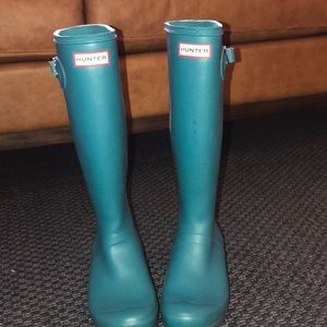 Bright teal Hunter rain boots